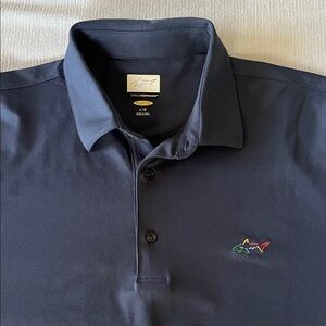 Greg Norman Collection Men's Dark Blue Polo with Logo